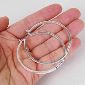 brand new in pouch! large 2 inch silver hoops with twist minimalist